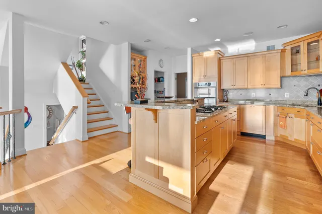a bedroom with furniture and a flat screen tv