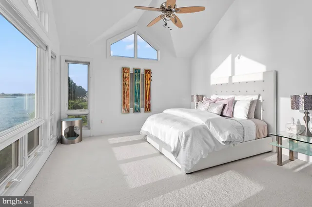 a view of a balcony with wooden floor