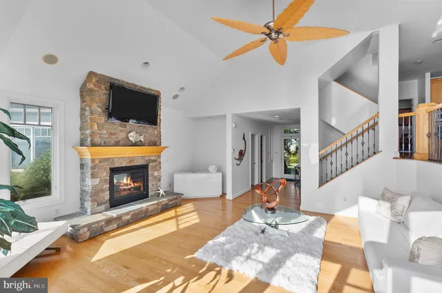 a bathroom with a toilet a sink and a mirror