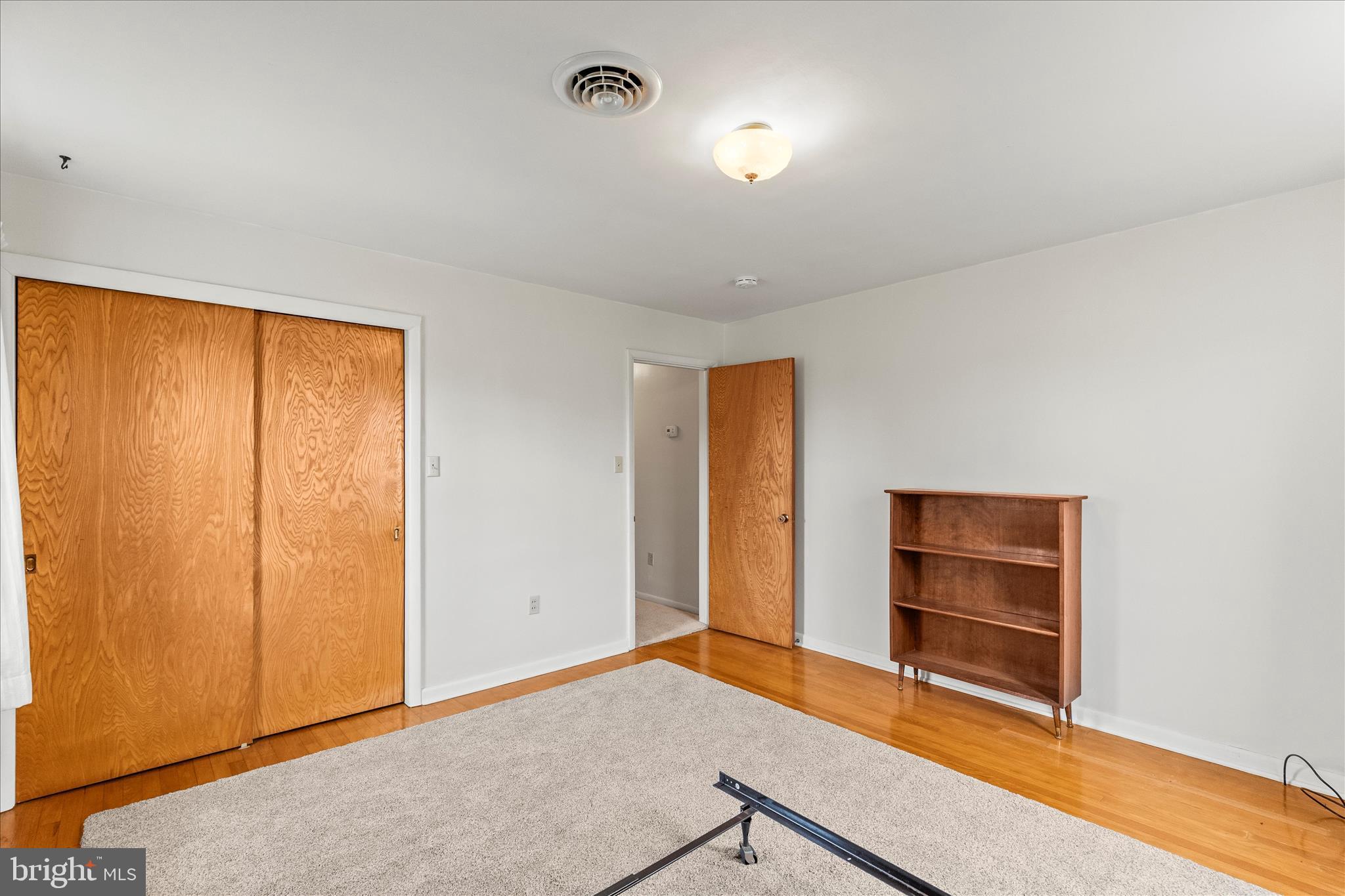 1055 South Main Street Chambersburg, PA 17201 - Photo 14 of 31 an empty room with a closet and window