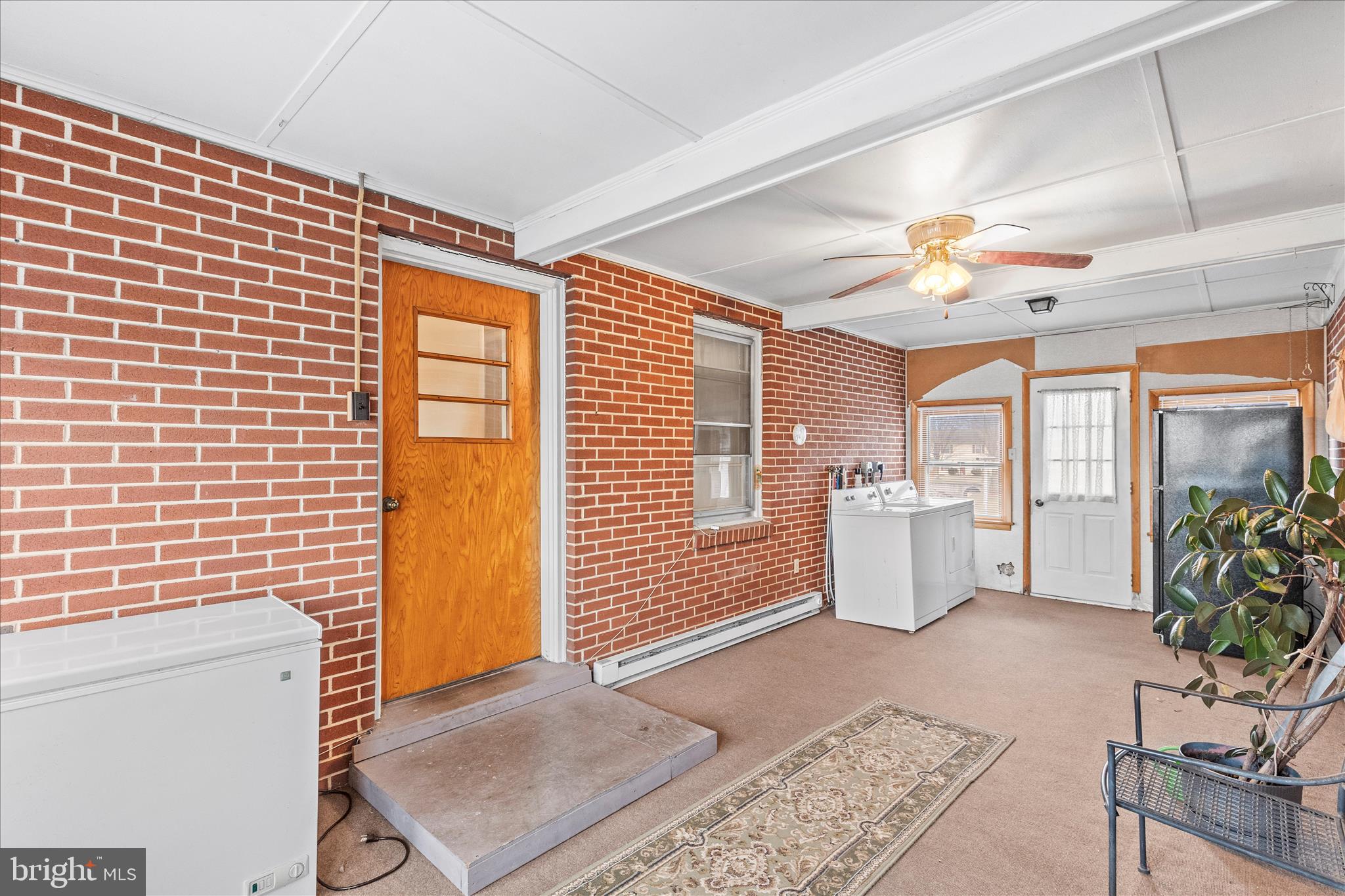 1055 South Main Street Chambersburg, PA 17201 - Photo 18 of 31 a view of an empty room with a window