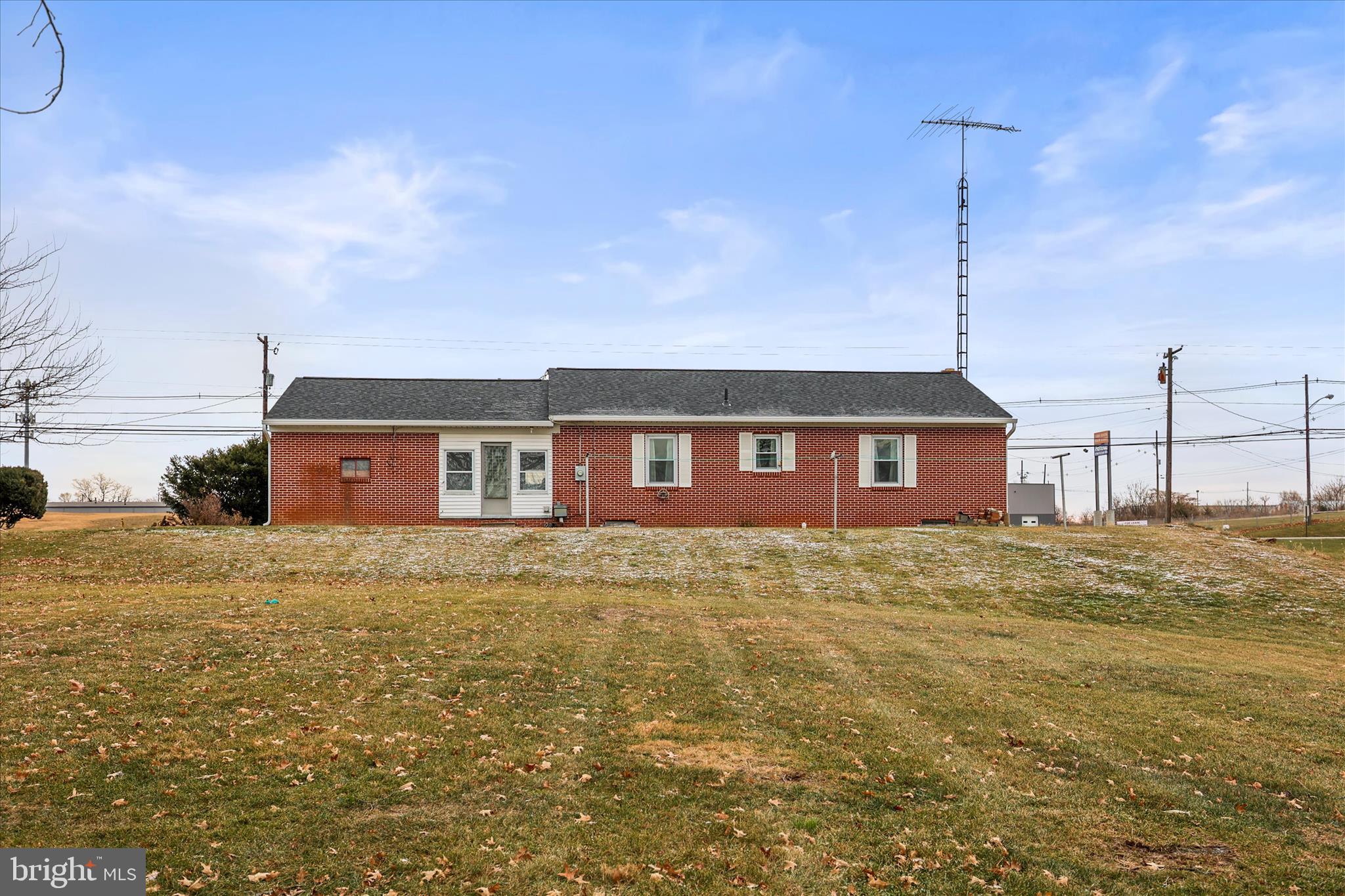 1055 South Main Street Chambersburg, PA 17201 - Photo 26 of 31 a view of a house next to a big yard