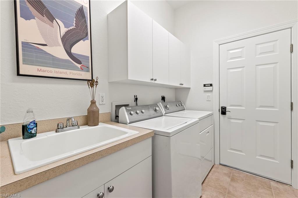 8975 Morgan Court Naples, FL 34113 - Photo 19 of 26 Laundry room