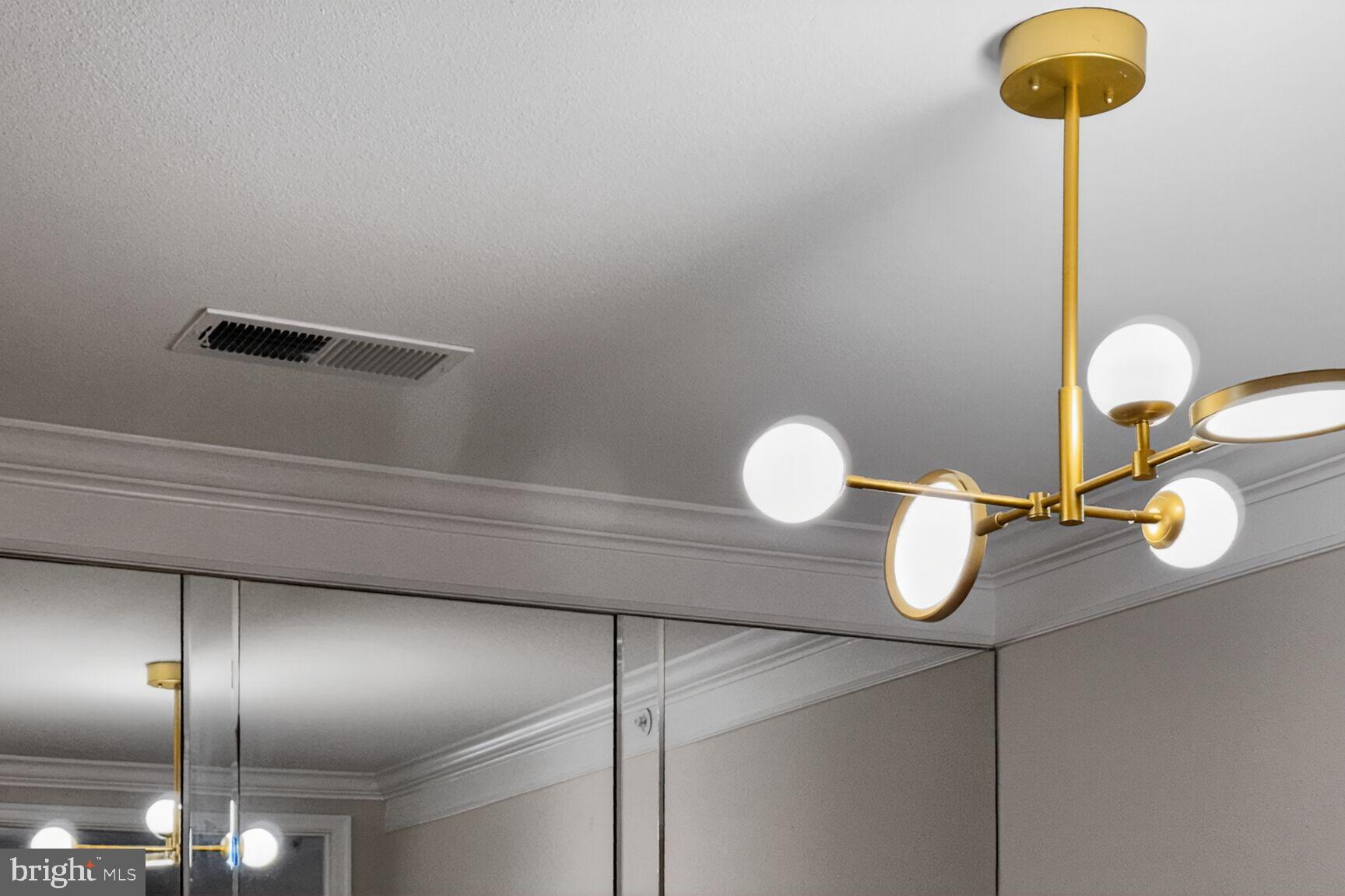 1601 Spring Gate Dr., Unit 1411 McLean, VA 22102 - Photo 16 of 39 a bathroom with a sink and a mirror