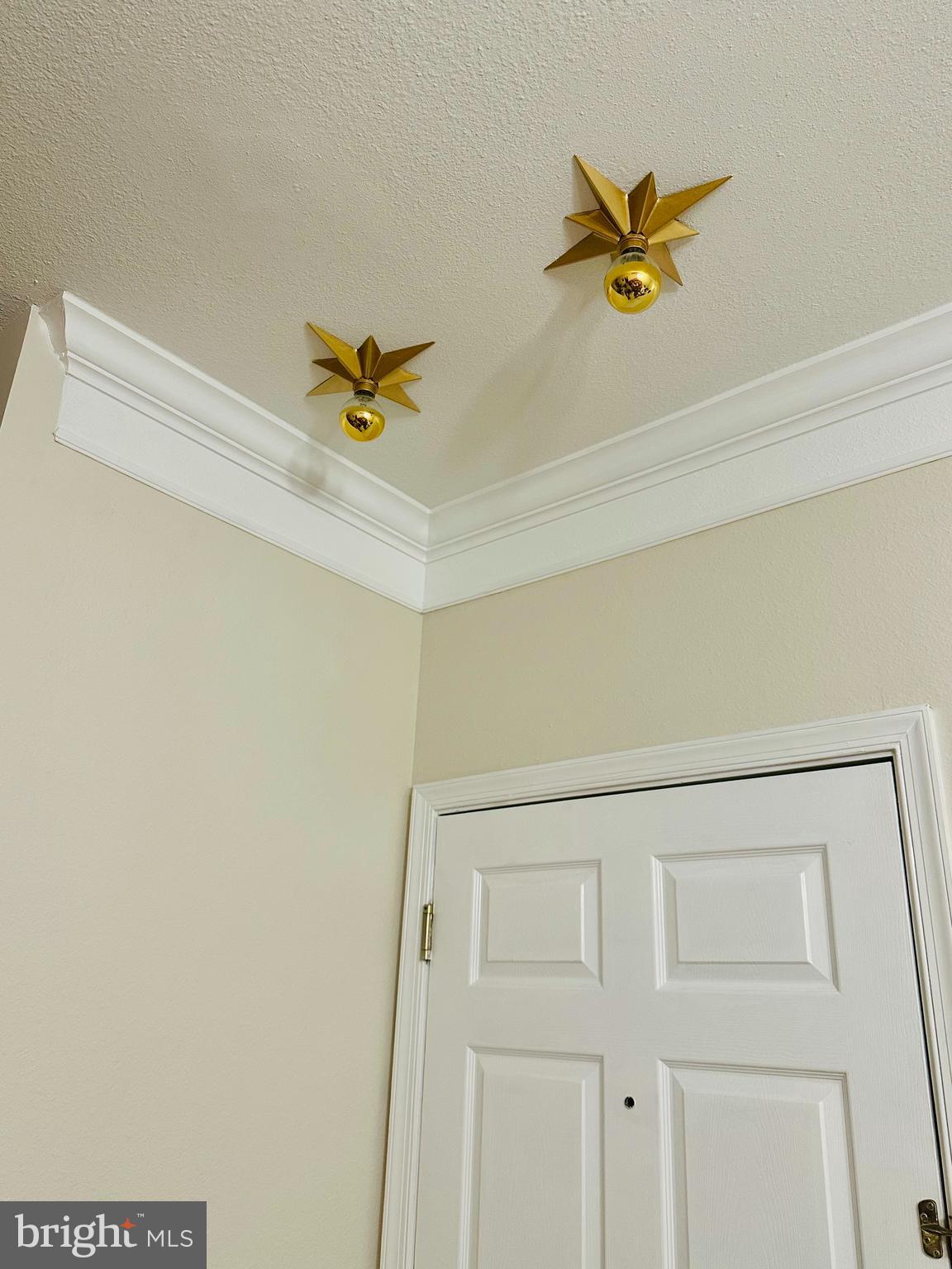 1601 Spring Gate Dr., Unit 1411 McLean, VA 22102 - Photo 19 of 39 a view of a hallway with a ceiling fan