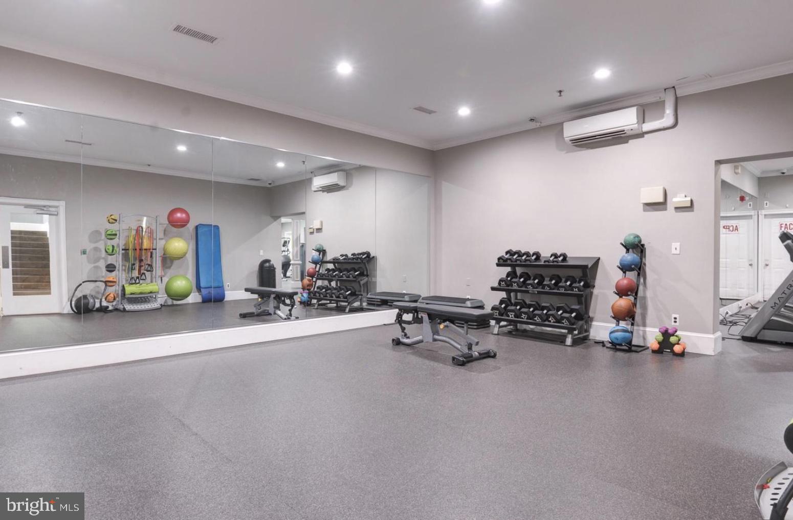 1601 Spring Gate Dr., Unit 1411 McLean, VA 22102 - Photo 31 of 39 a view of a room with gym equipment