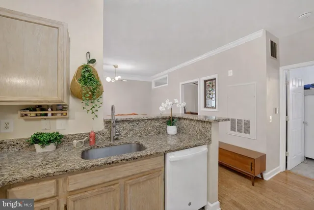 a bathroom with sink and mirror