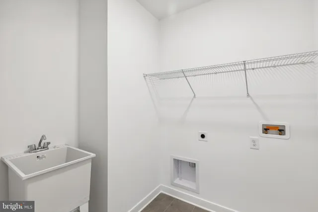 a bathroom with a sink a mirror and shower