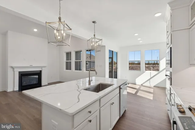 a view of kitchen and sink