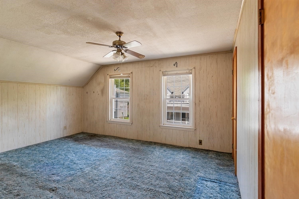 19 Butler Avenue Wakefield, MA 01880 - Photo 24 of 33 wooden floor in an empty room with a window