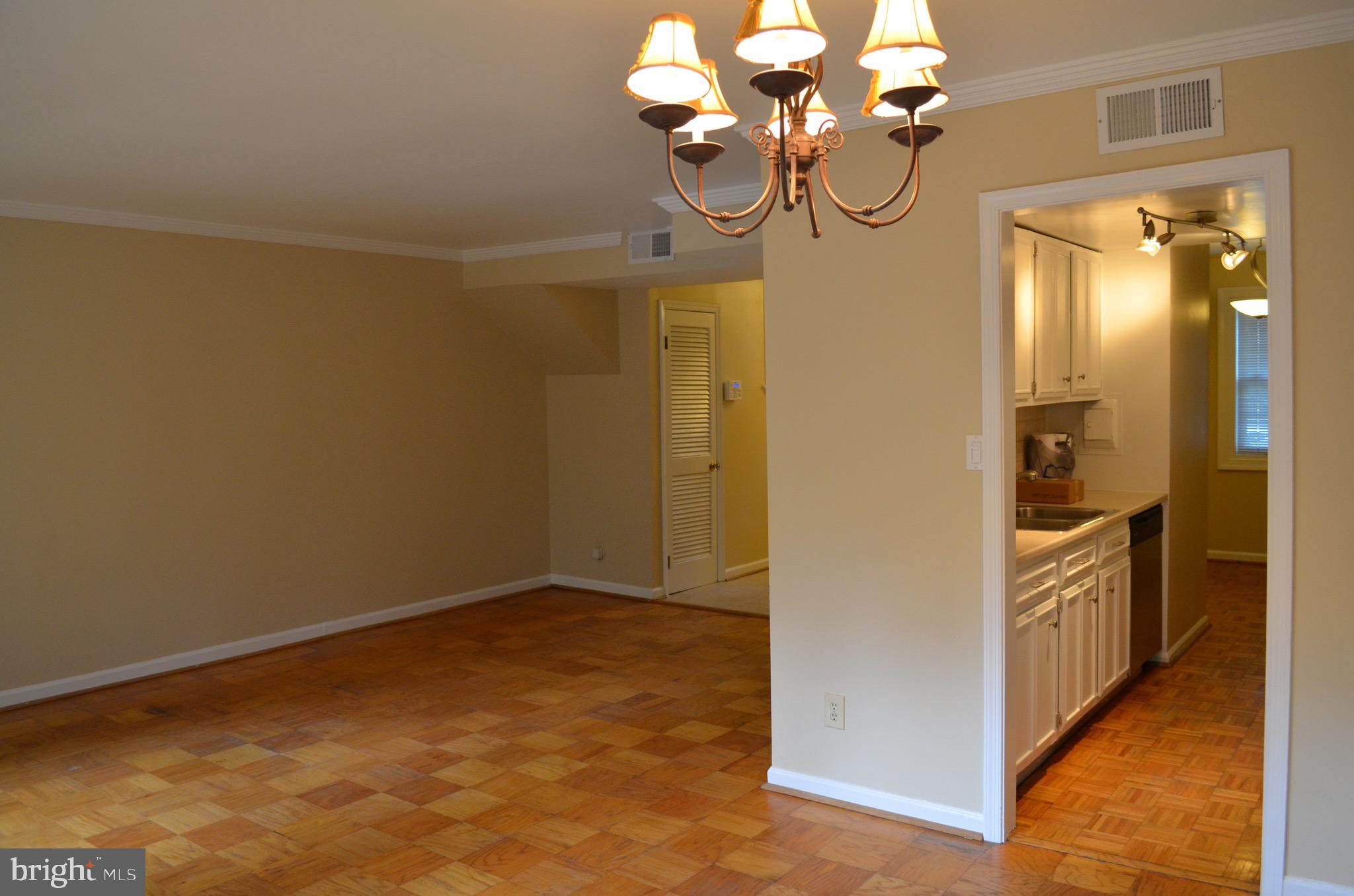 8902 16th Street Silver Spring, MD 20910 - Photo 2 of 70 Dining area leading to galley kitchen