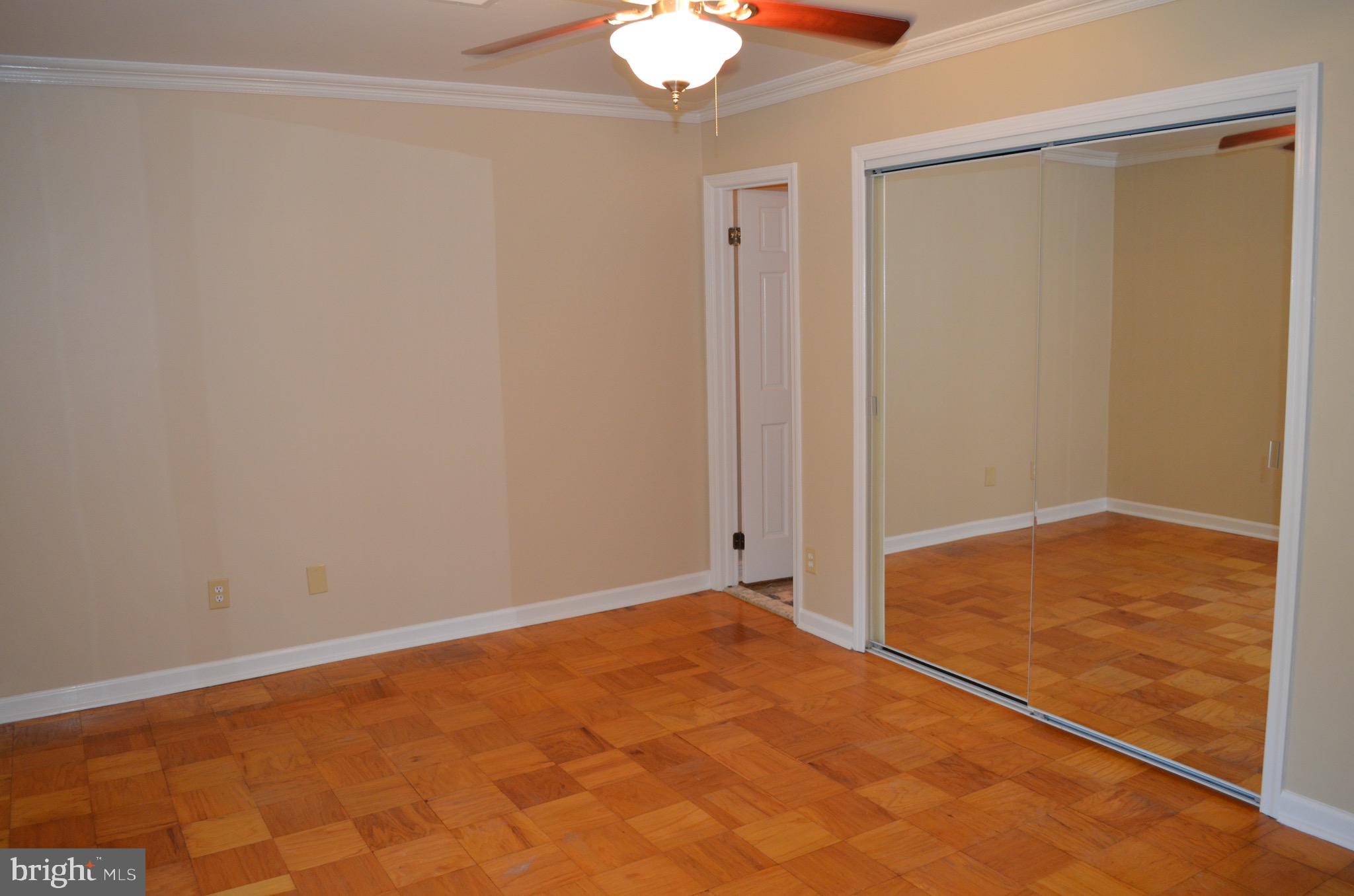 8902 16th Street Silver Spring, MD 20910 - Photo 36 of 70 Master bedroom with sliding mirrored closet doors