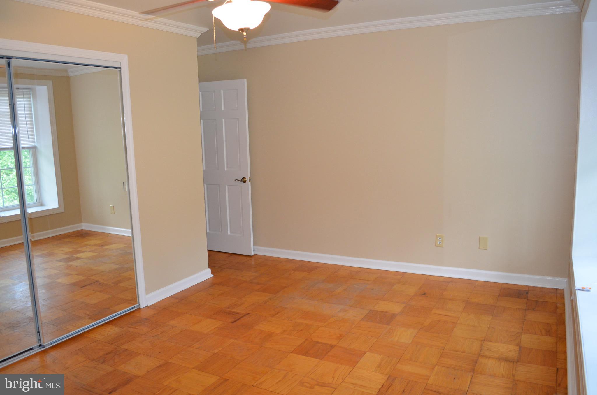 8902 16th Street Silver Spring, MD 20910 - Photo 37 of 70 Master bedroom with sliding mirrored closet doors