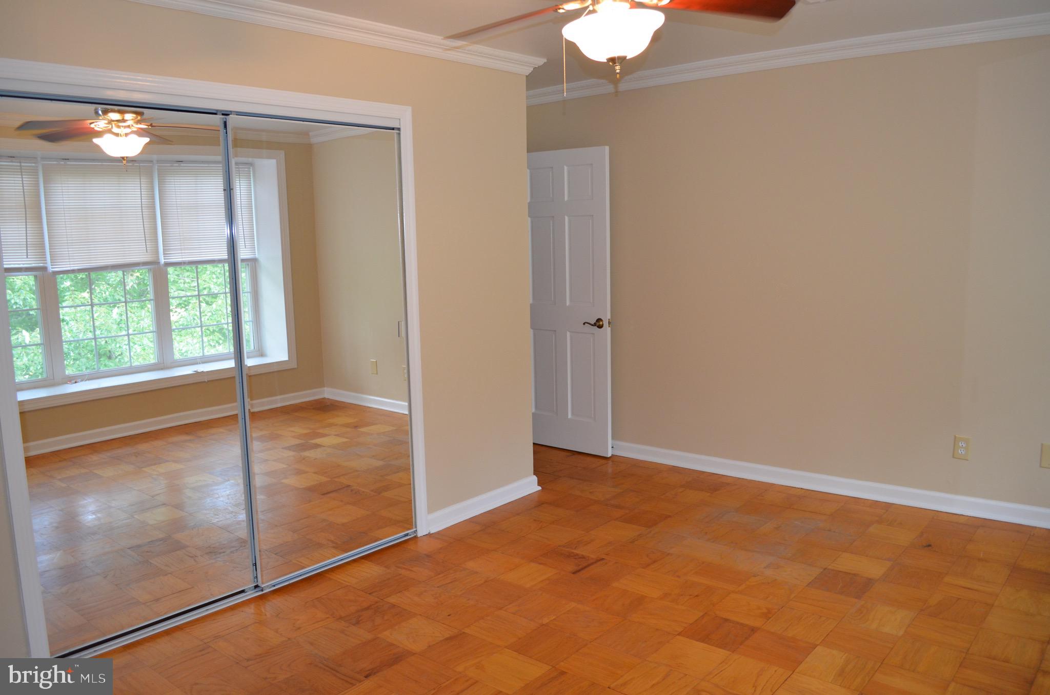 8902 16th Street Silver Spring, MD 20910 - Photo 38 of 70 Master bedroom with sliding mirrored closet doors