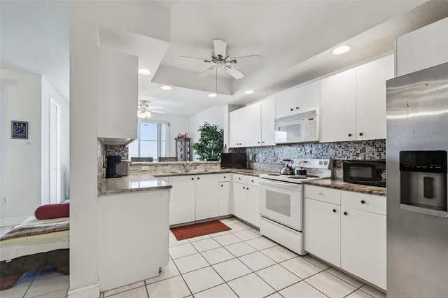 $830,000 | 4991 Bacopa Lane South, Unit 502, St. Petersburg, FL 33715