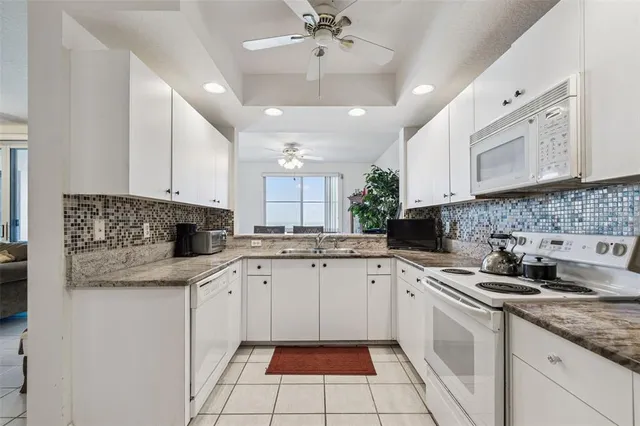 $830,000 | 4991 Bacopa Lane South, Unit 502, St. Petersburg, FL 33715