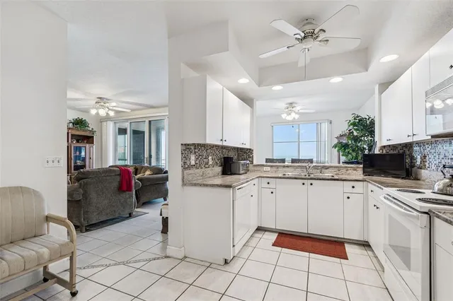$830,000 | 4991 Bacopa Lane South, Unit 502, St. Petersburg, FL 33715