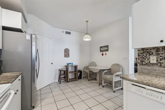 $830,000 | 4991 Bacopa Lane South, Unit 502, St. Petersburg, FL 33715