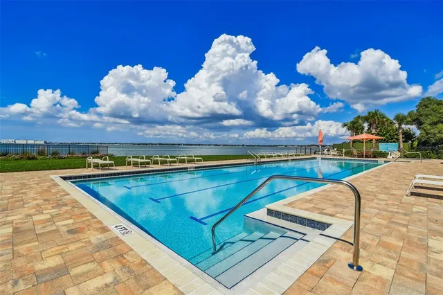 $830,000 | 4991 Bacopa Lane South, Unit 502, St. Petersburg, FL 33715