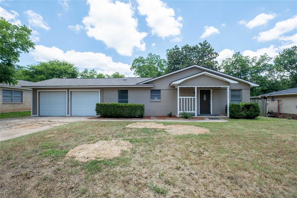 3126 Colgate Avenue Tyler, TX 75701 - Photo 1 of 33 a front view of a house with a yard and garage