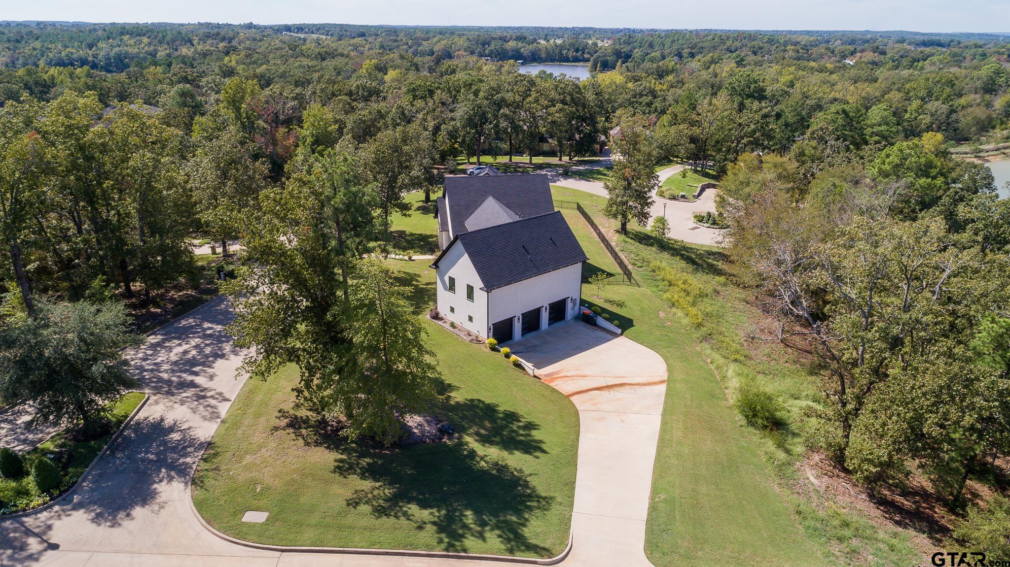 2854 J J.Cupit Court Tyler, TX 75709 - Photo 11 of 48 an aerial view of a house with a yard