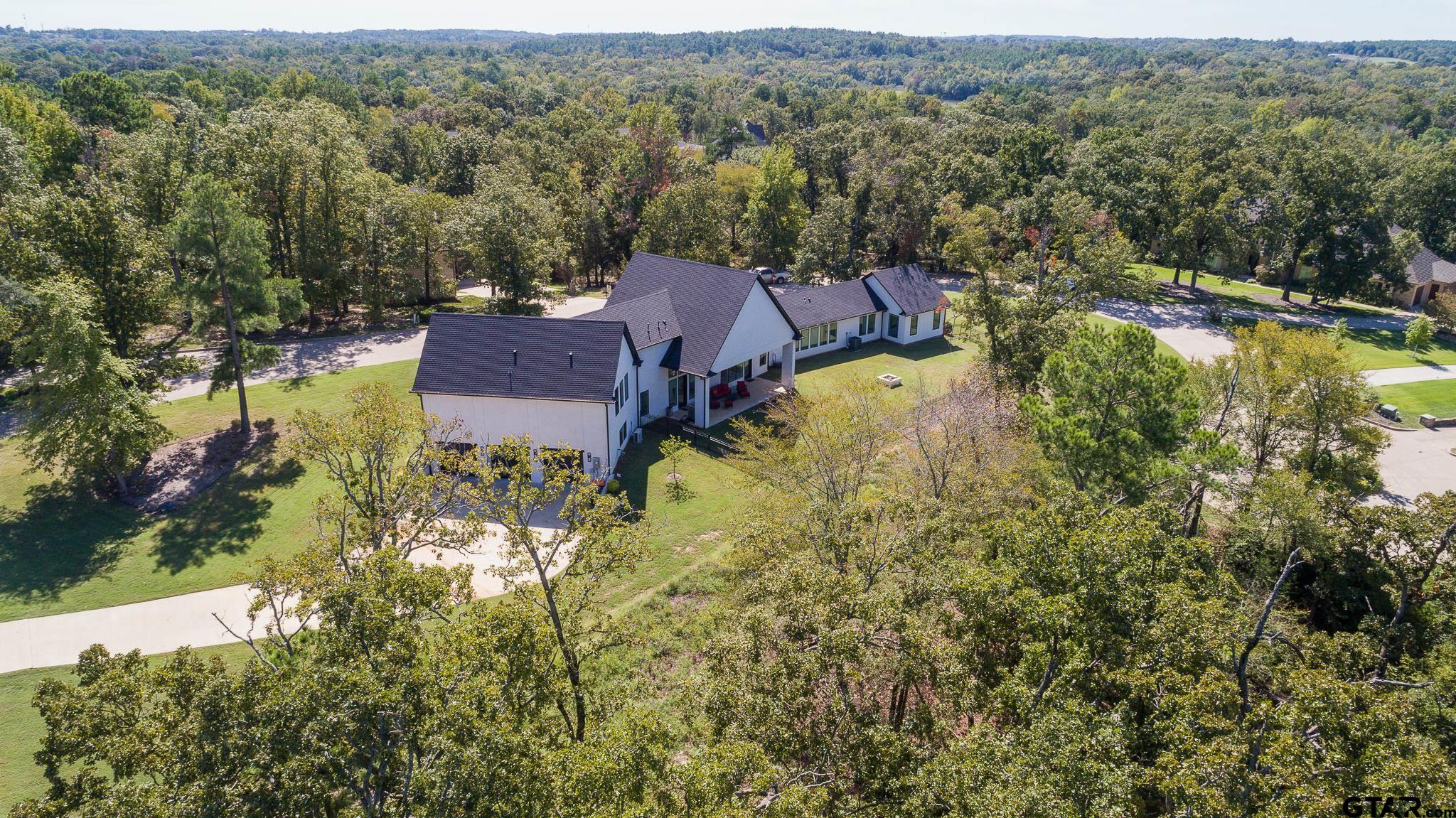 2854 J J.Cupit Court Tyler, TX 75709 - Photo 12 of 48 an aerial view of a house with a garden