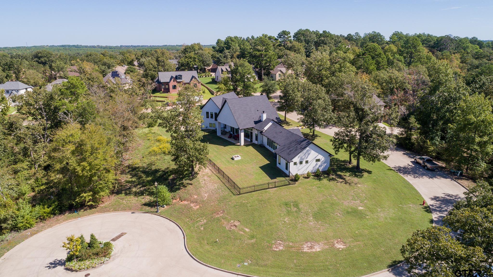 2854 J J.Cupit Court Tyler, TX 75709 - Photo 13 of 48 an aerial view of a house with yard and swimming pool