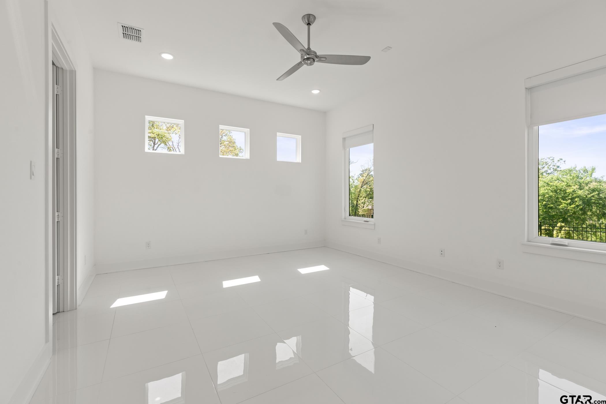 2854 J J.Cupit Court Tyler, TX 75709 - Photo 27 of 48 a view of an empty room with a window