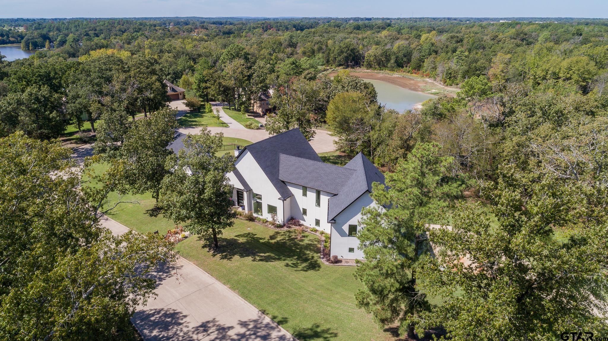 2854 J J.Cupit Court Tyler, TX 75709 - Photo 3 of 48 an aerial view of house with yard and mountain view