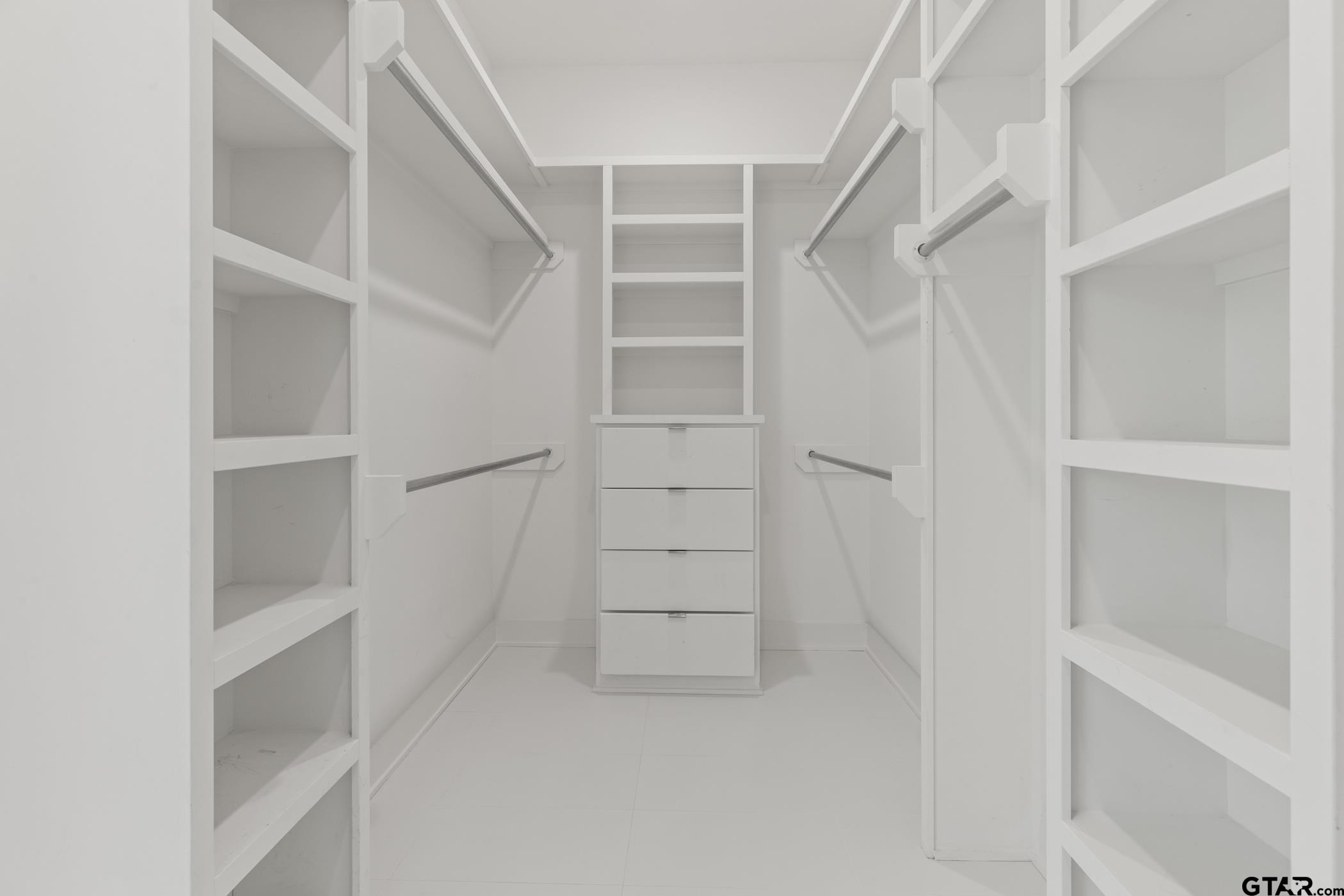 2854 J J.Cupit Court Tyler, TX 75709 - Photo 31 of 48 a view of walk in closet with empty racks