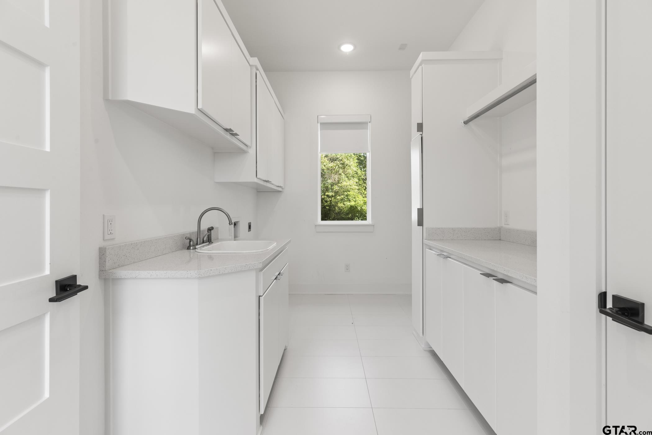 2854 J J.Cupit Court Tyler, TX 75709 - Photo 32 of 48 a bathroom with a sink a toilet and shower