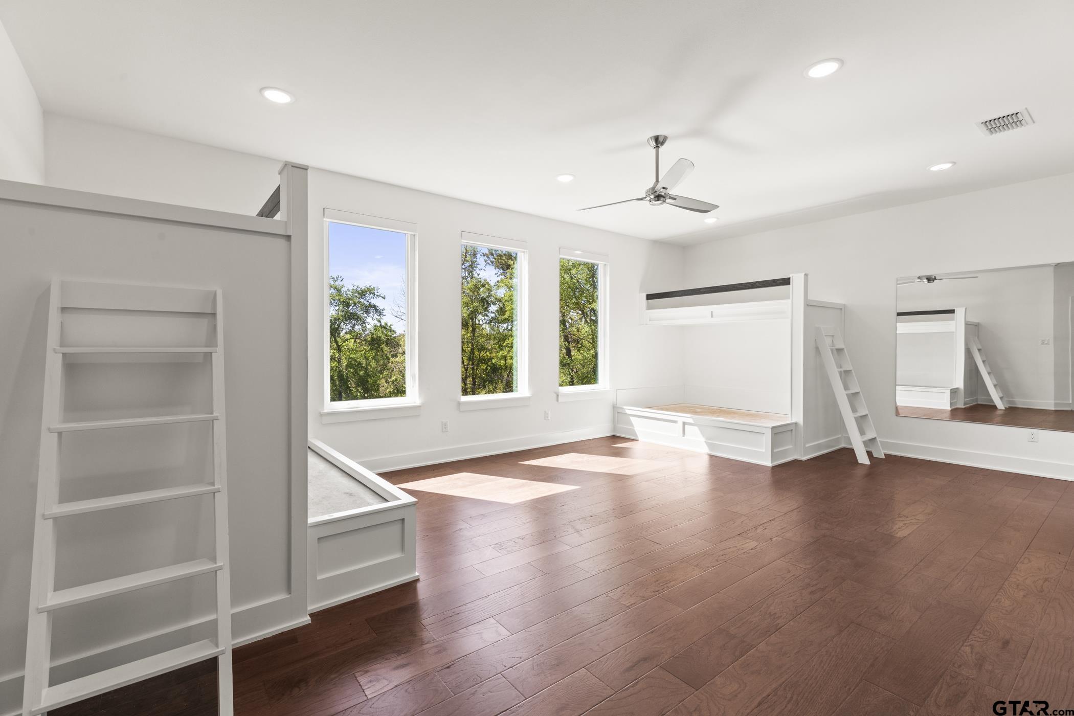 2854 J J.Cupit Court Tyler, TX 75709 - Photo 42 of 48 a view of an empty room with a window and wooden floor
