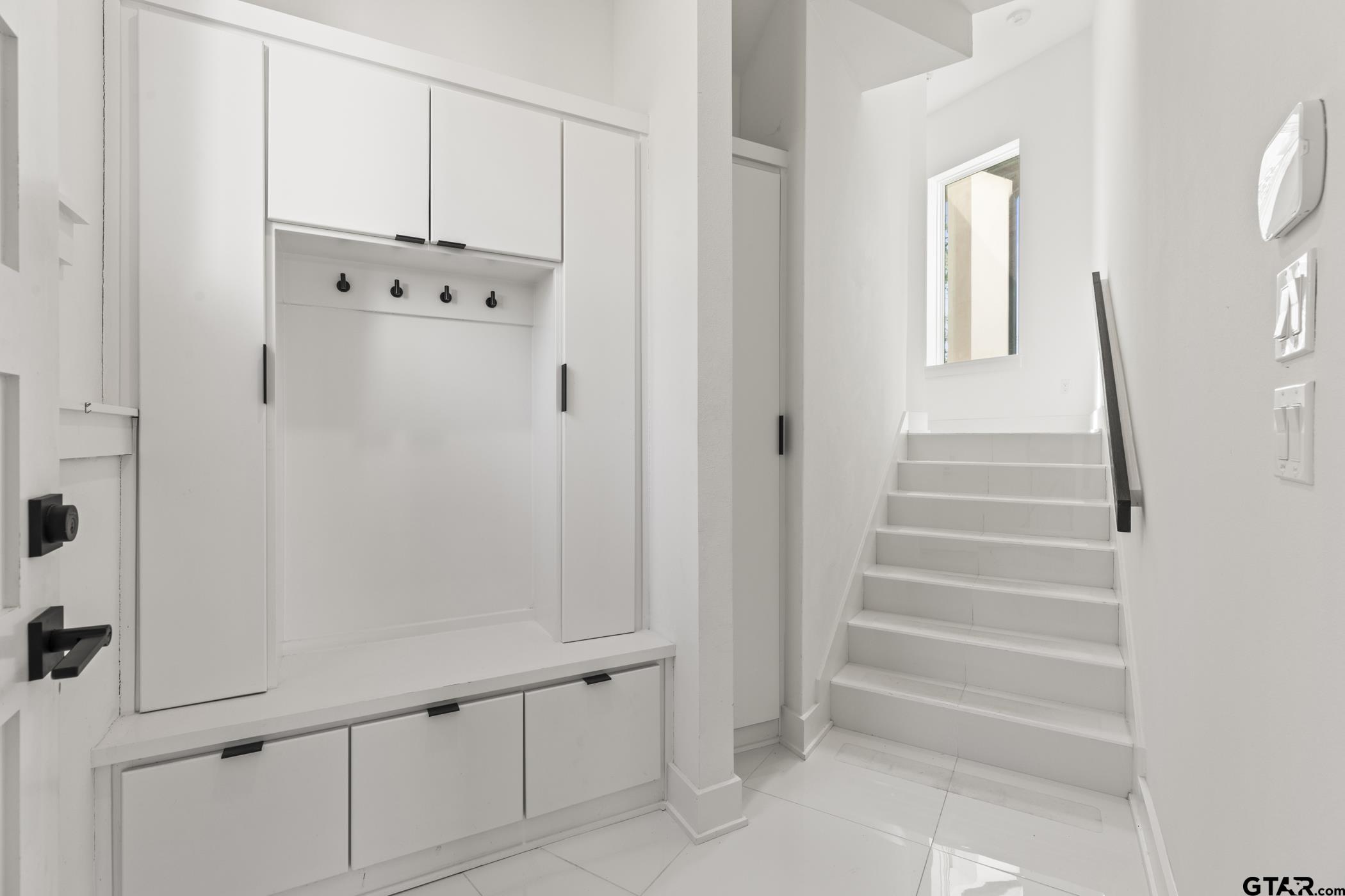 2854 J J.Cupit Court Tyler, TX 75709 - Photo 48 of 48 a view of an entryway with staircase