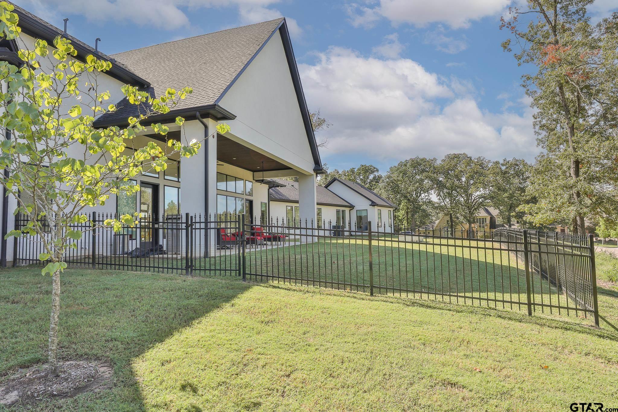 2854 J J.Cupit Court Tyler, TX 75709 - Photo 7 of 48 a view of a backyard
