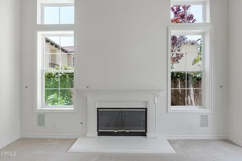 a view of a dining room with furniture window and chandelier