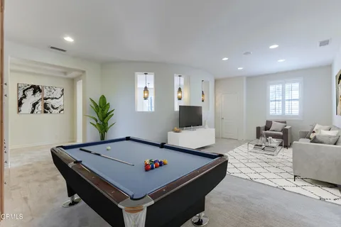 a view of a livingroom with a flat screen tv