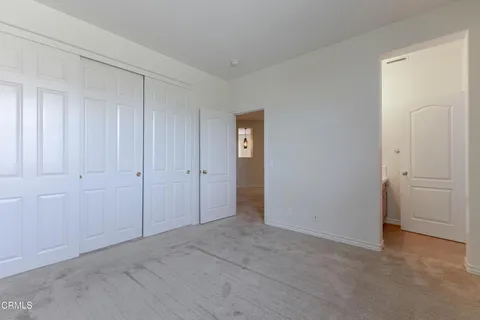 a view of a house with a yard and plants