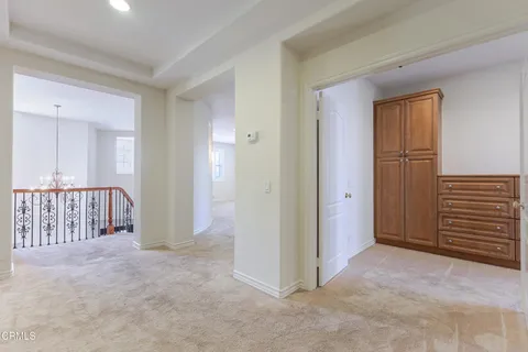 a front view of a house with a yard table and chairs