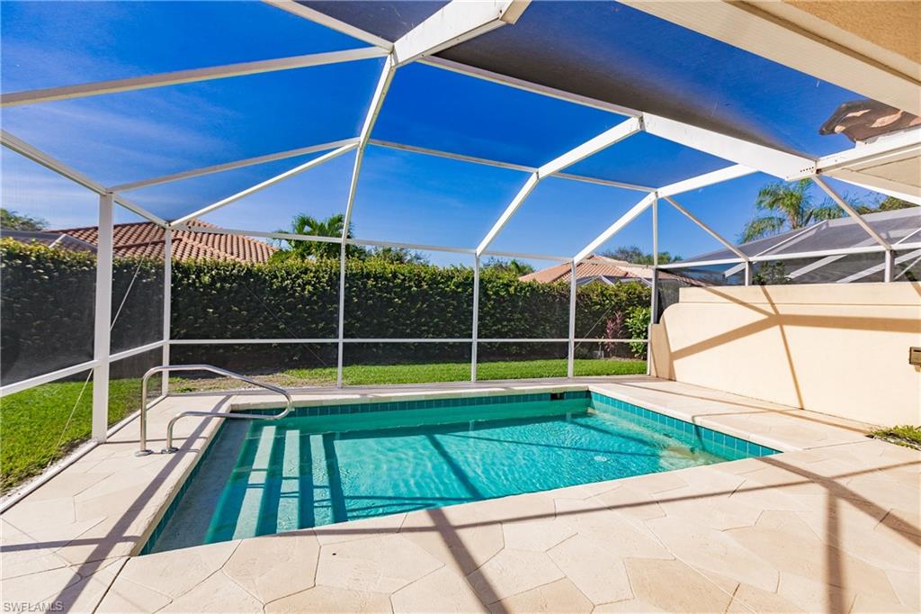4113 Tabago Lane Naples, FL 34119 - Photo 39 of 50 View of swimming pool with a patio and a lanai