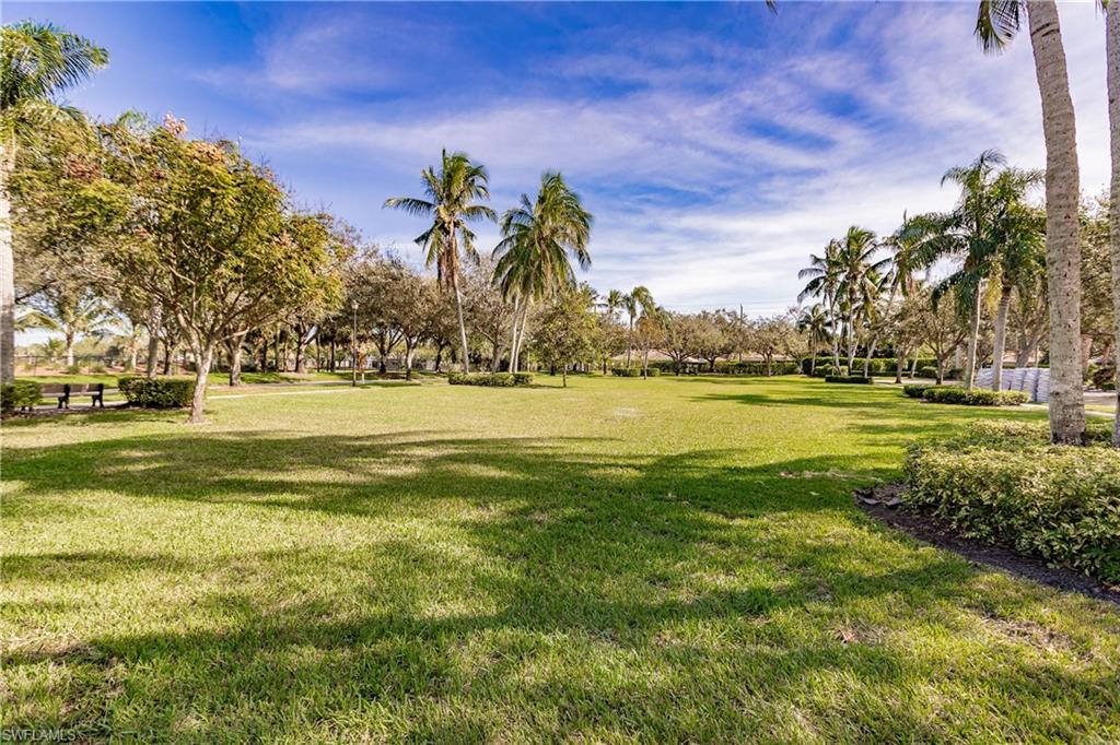 4113 Tabago Lane Naples, FL 34119 - Photo 43 of 50 View of community with a lawn