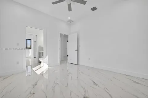 en empty room with white walls and white walls