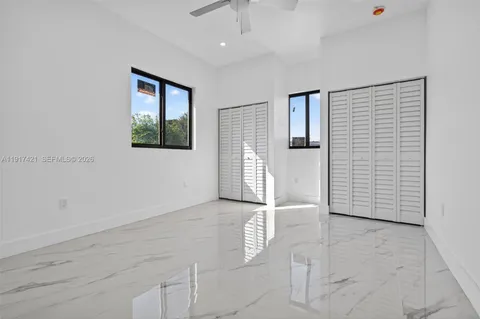 an empty room with windows