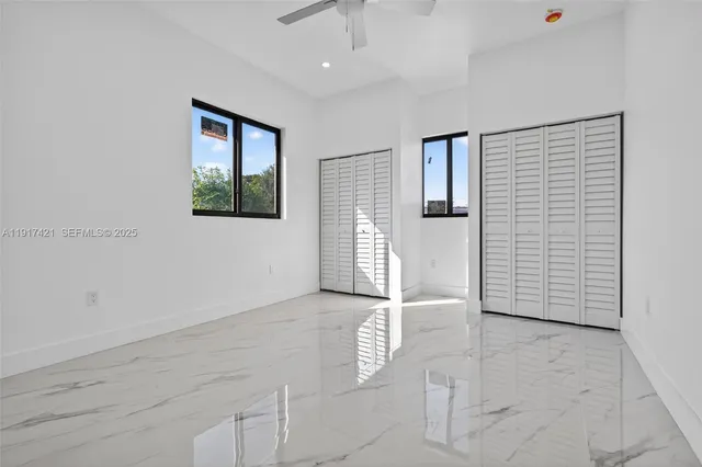 an empty room with windows