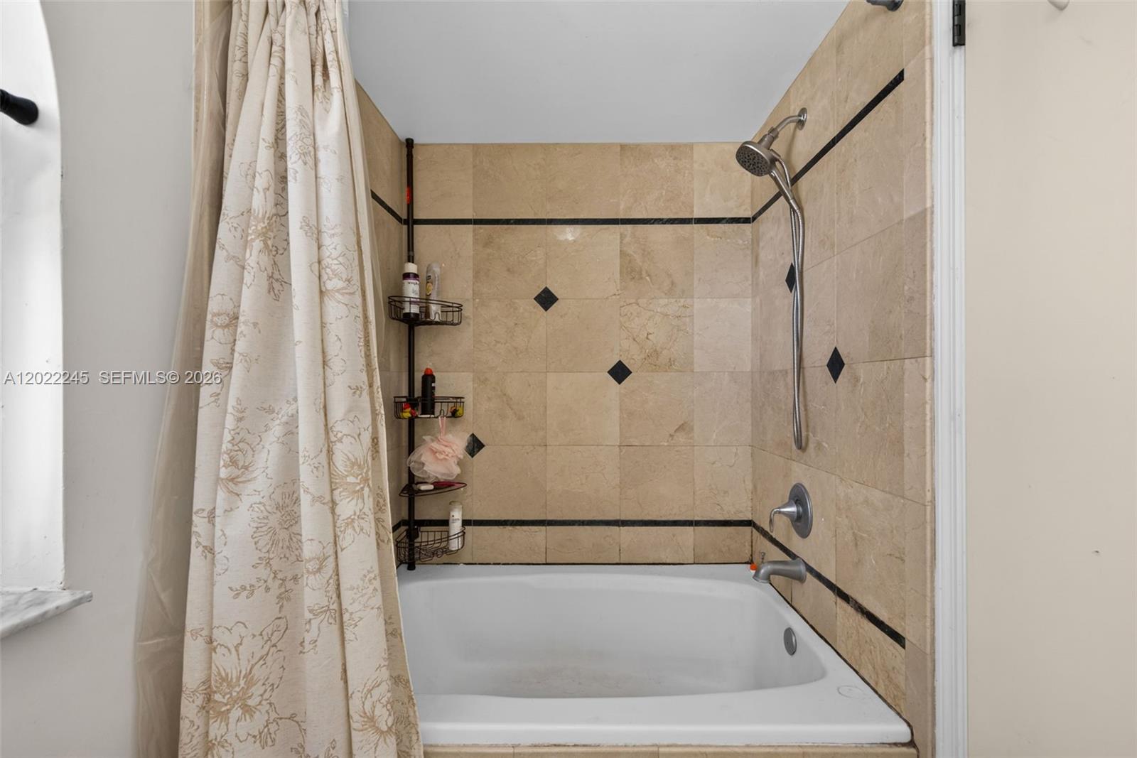 15530 Southwest 59th Street Miami, FL 33193 - Photo 30 of 58 a bathroom with a tub and shower