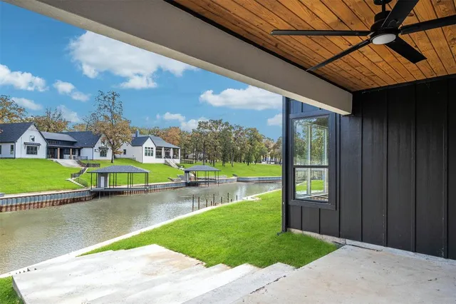 a view of an swimming pool with a yard