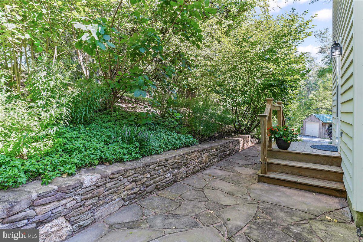 72 East Highland Road Parkesburg, PA 19365 - Photo 33 of 40 Side Entrance from stone patio