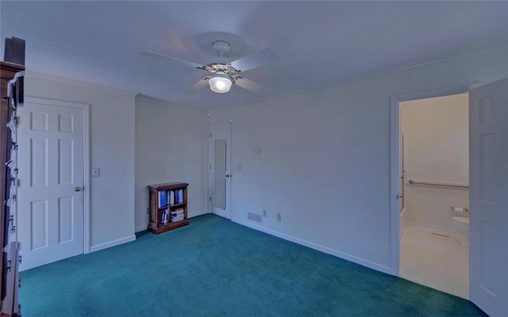 290 Waterfall Drive Cleveland, GA 30528 - Photo 12 of 46 an empty room with closet and windows