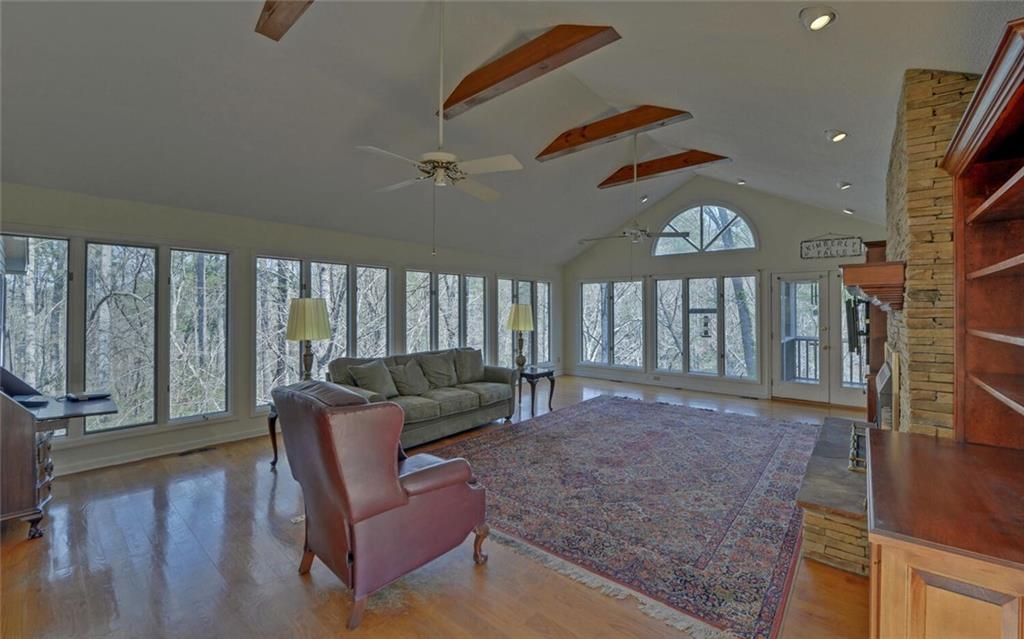 290 Waterfall Drive Cleveland, GA 30528 - Photo 14 of 46 a living room with furniture and a large window