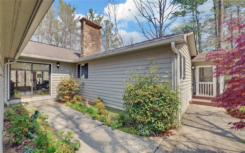 290 Waterfall Drive Cleveland, GA 30528 - Photo 22 of 46 a front view of a house with garden