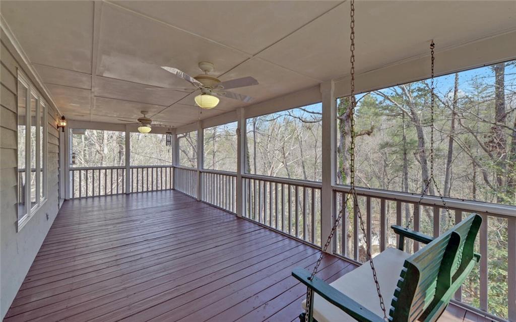 290 Waterfall Drive Cleveland, GA 30528 - Photo 33 of 46 a view of a porch with wooden floor and outdoor space